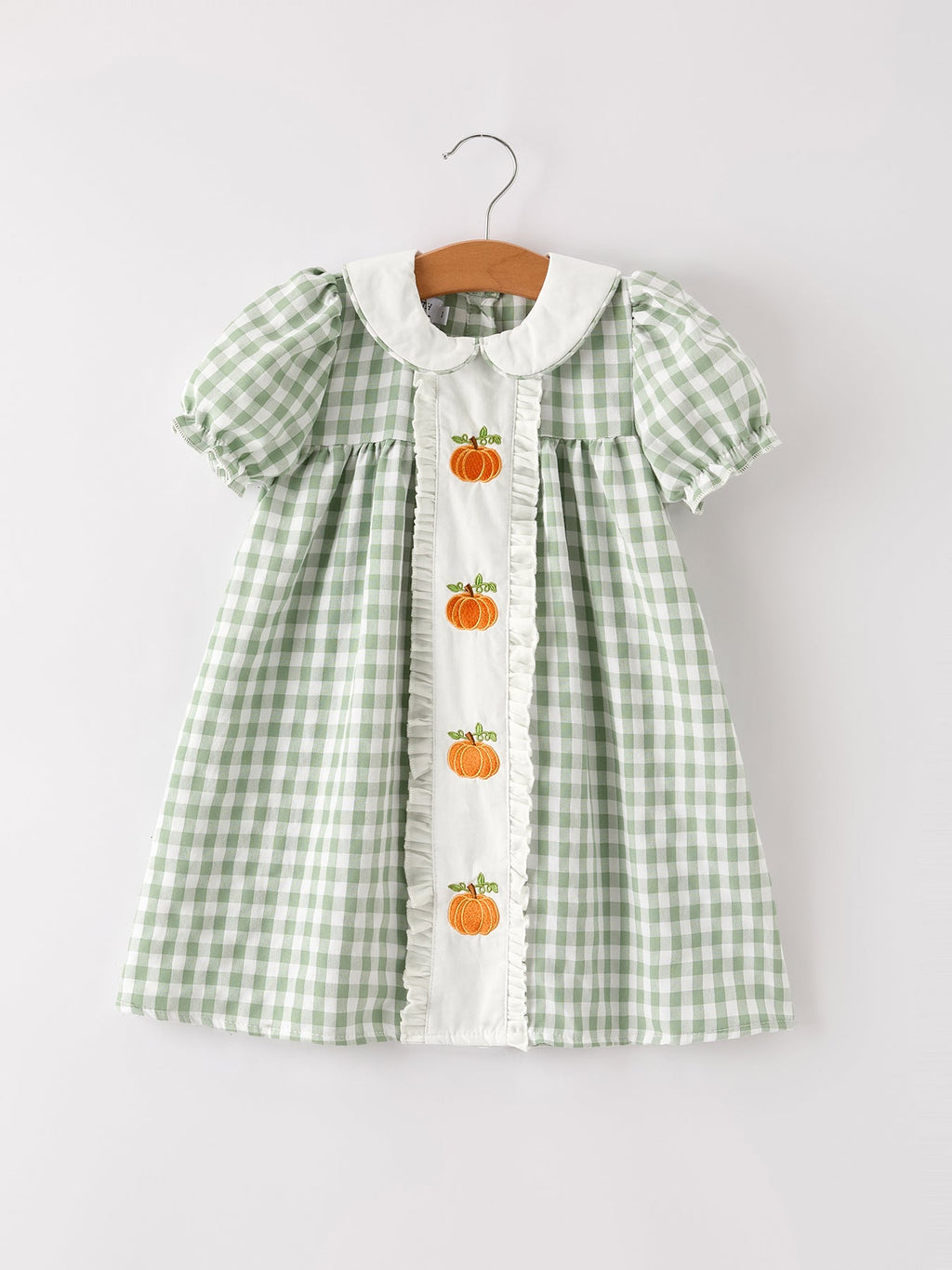 Green gingham girls dress with white button front and pumpkin applique center