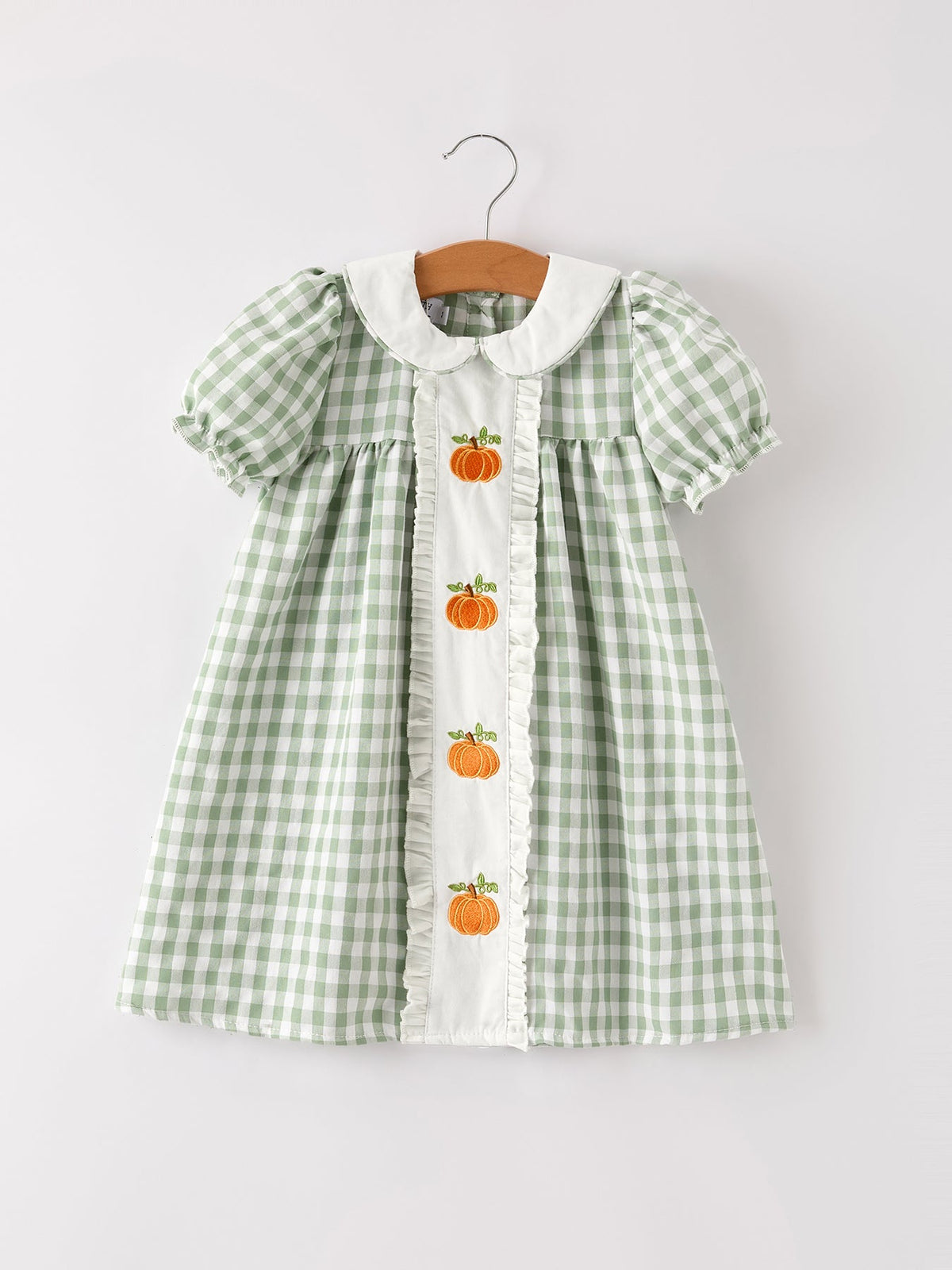 Green gingham girls dress with white button front and pumpkin applique center