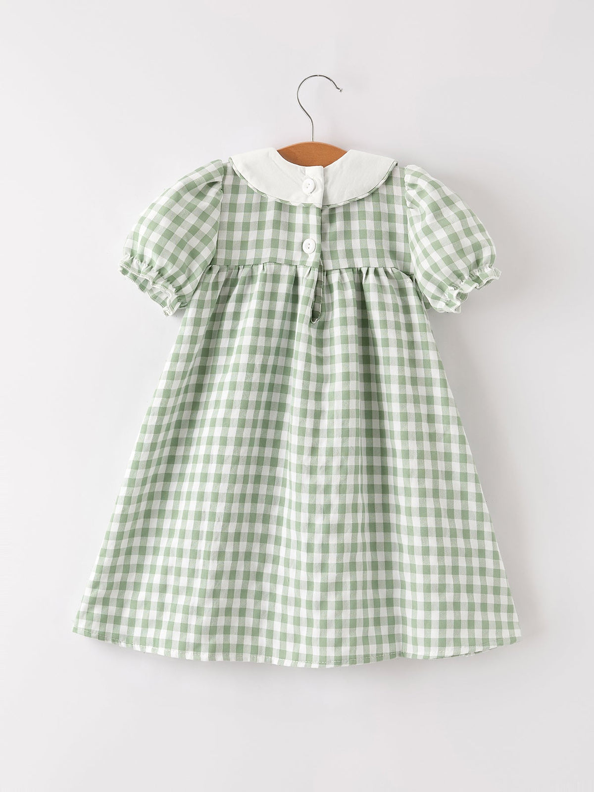 Green gingham girls dress with gathered back yoke and ruffled collar