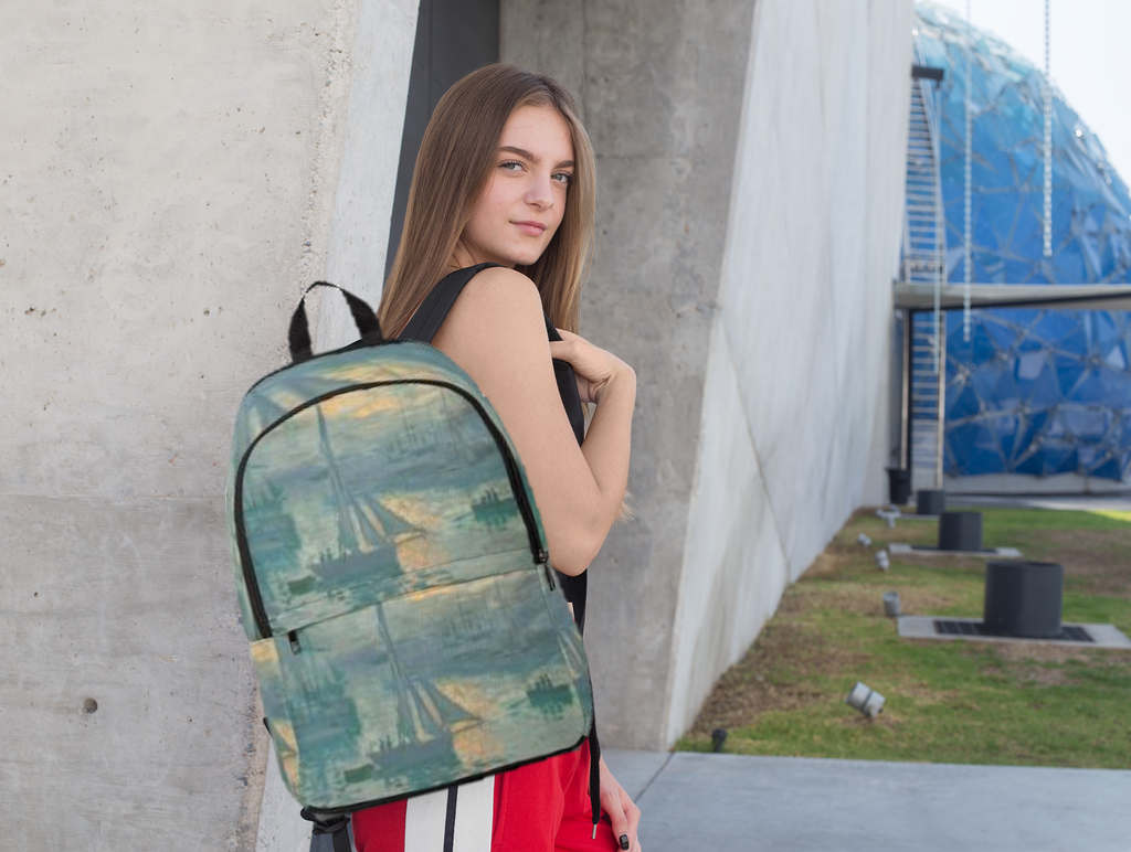 Printed fabric backpack with ocean scene, worn on shoulders with adjustable straps
