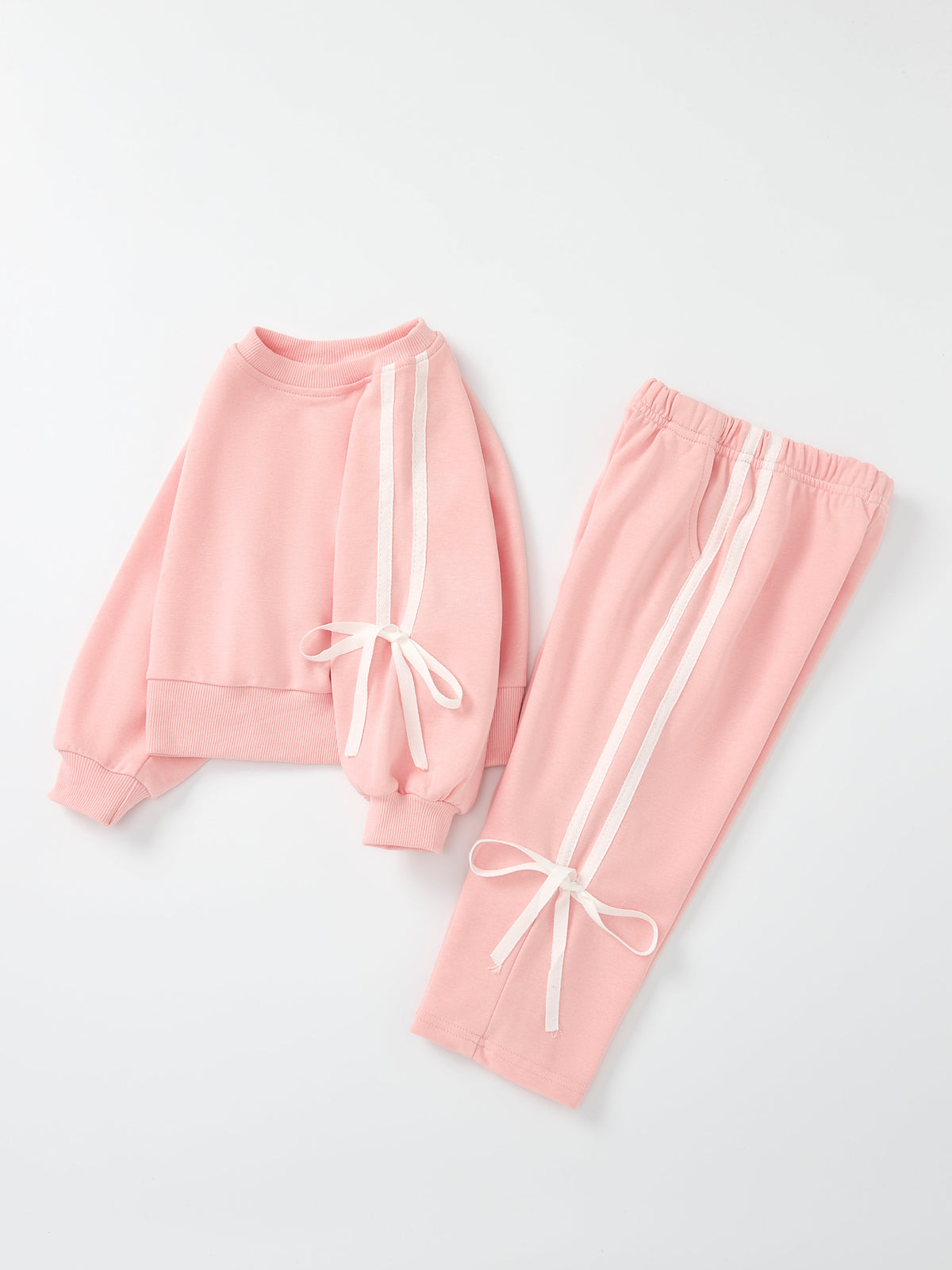 Girls pink bow-trim sweatshirt and pants set, front bow ties and striped details