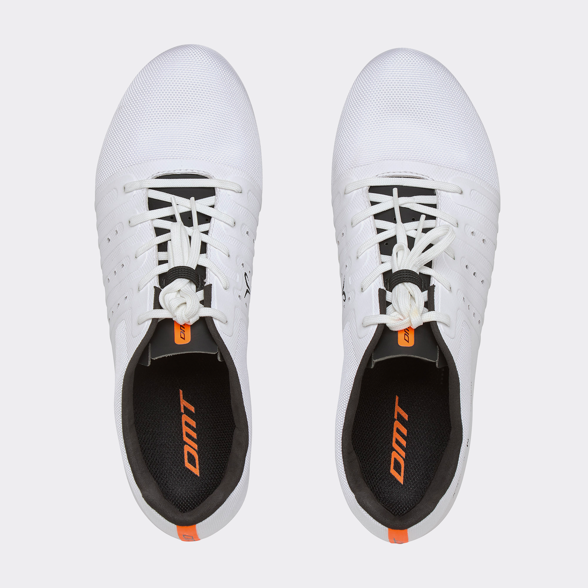 Pair of white road cycling shoes with lace-up closure and orange heel tag