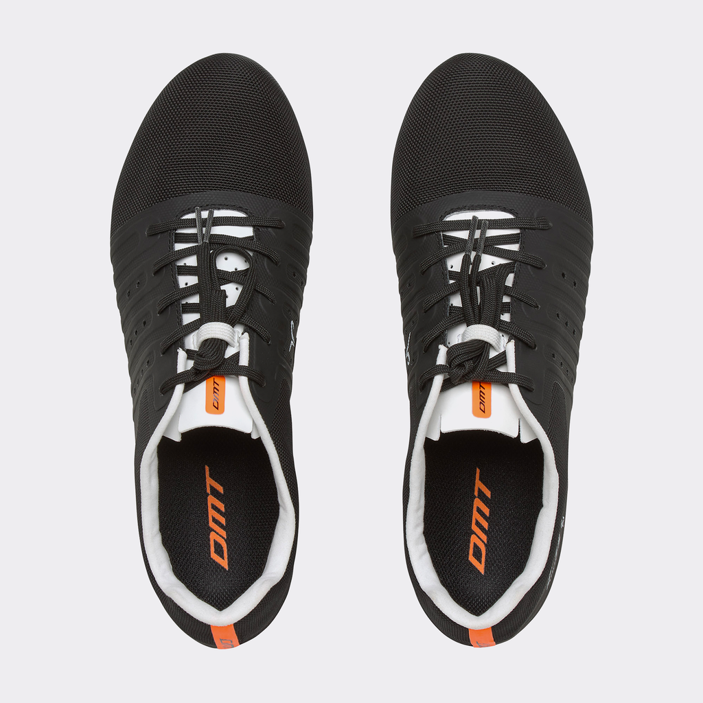 Pair of black road cycling shoes with lace-up closure and orange heel branding