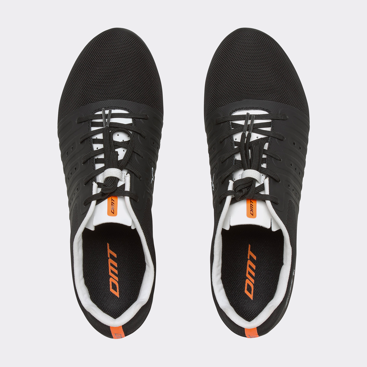 Pair of black road cycling shoes with lace-up closure and orange heel branding