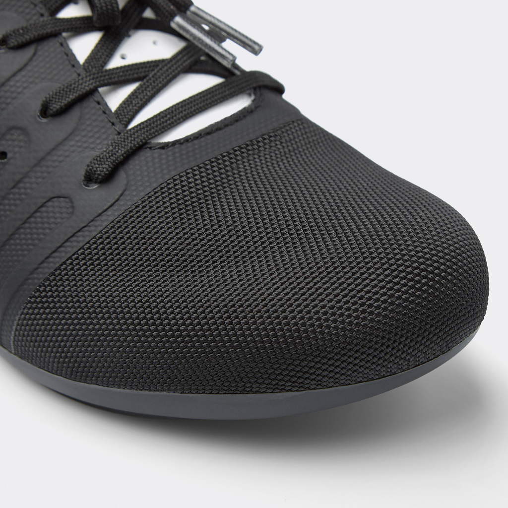 DMT KR4 PJ road shoe toe, black textured mesh upper and black rubber sole