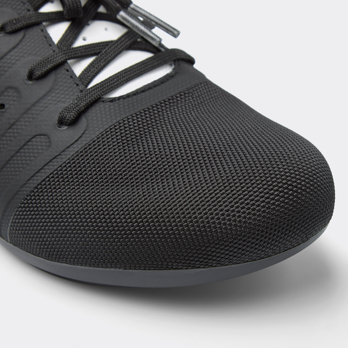 DMT KR4 PJ road shoe toe, black textured mesh upper and black rubber sole