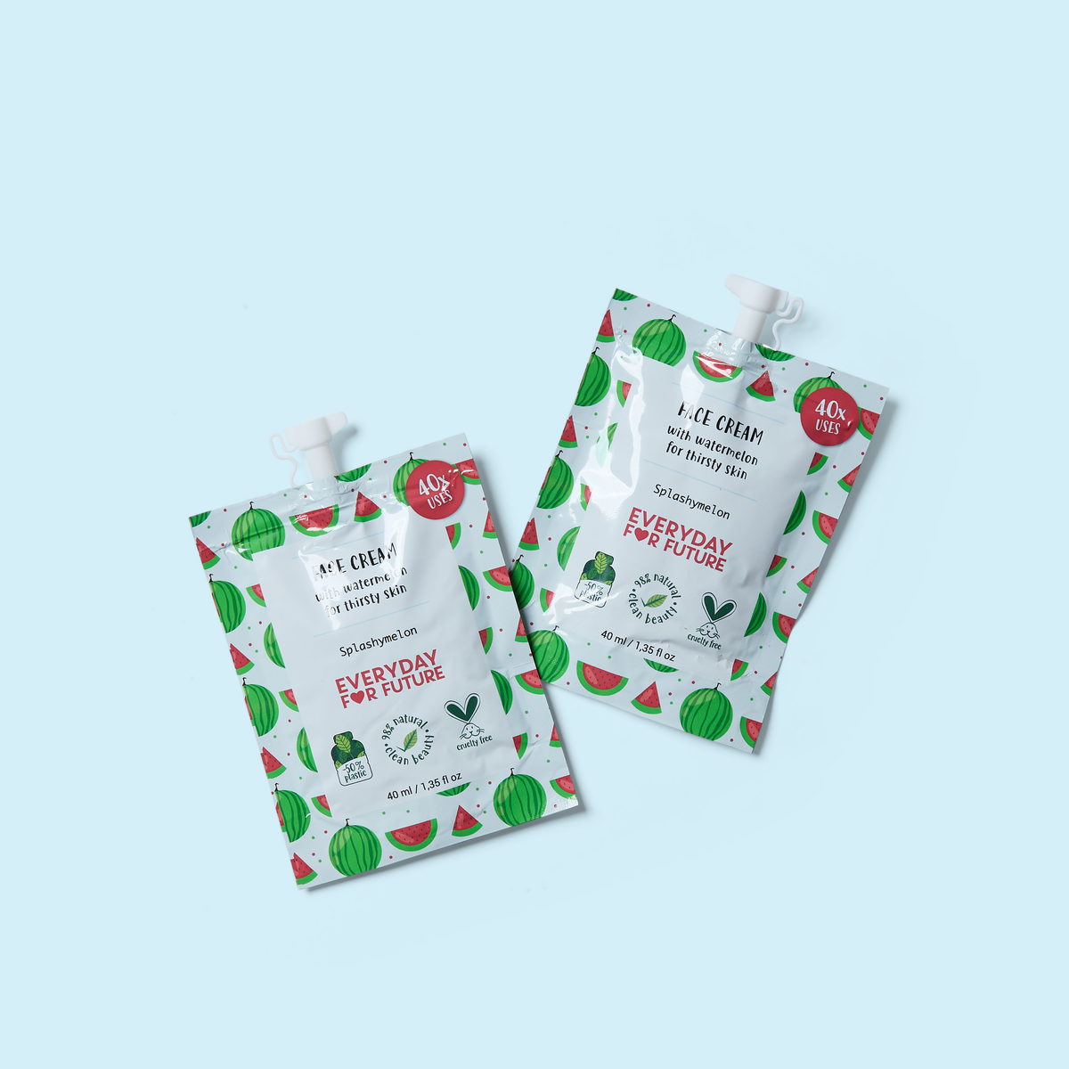 Everyday face cream pouches in white with green fruit pattern and red accents
