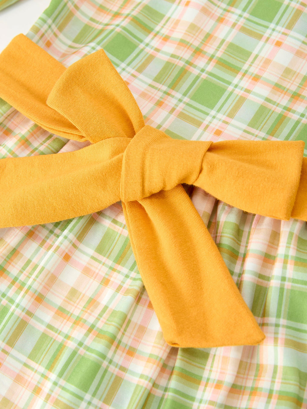 Girls plaid dress with large orange waist bow