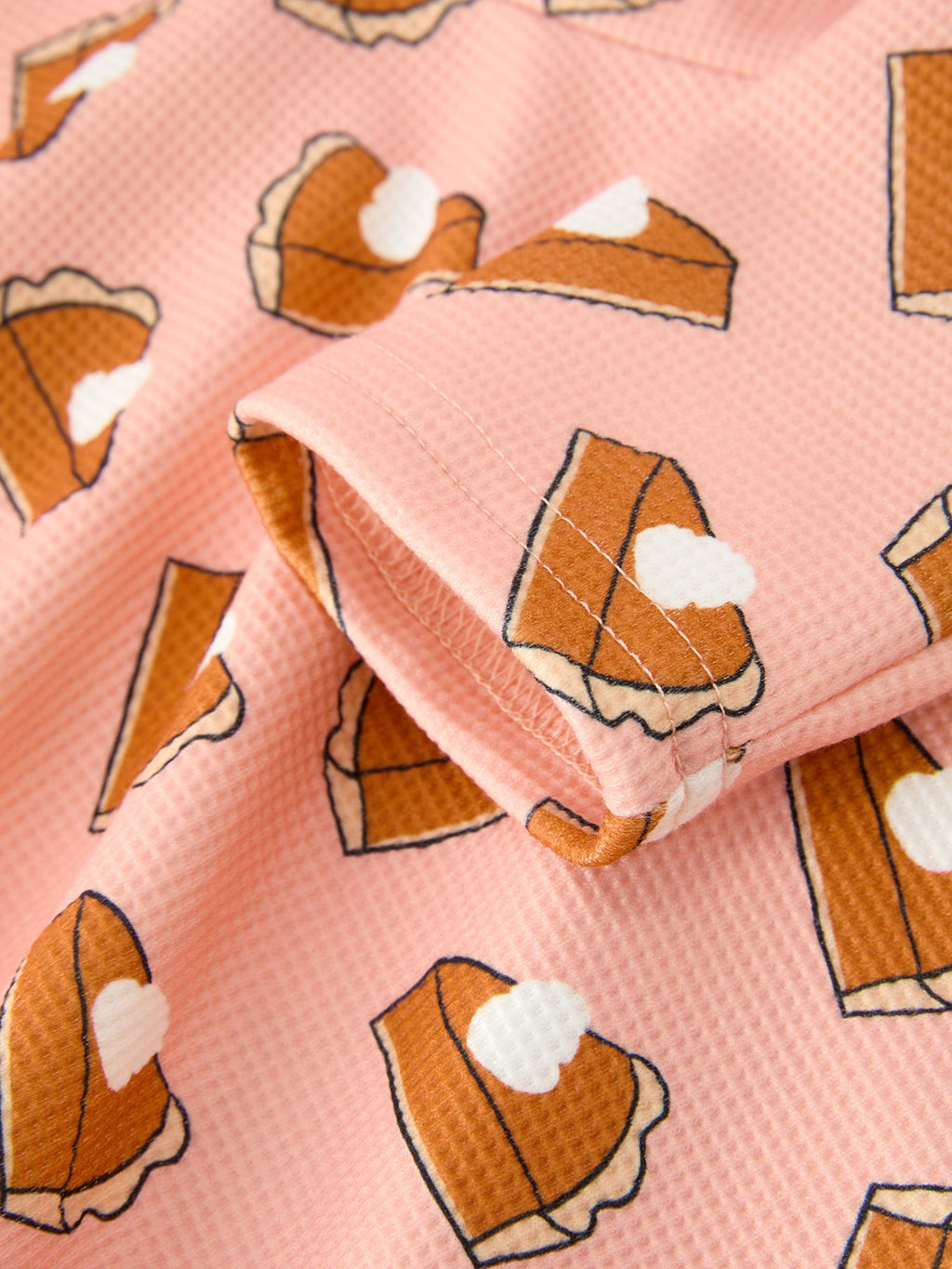 Girls pink pumpkin pie pattern dress with folded sleeve detail