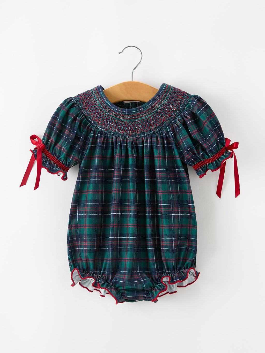 Girls plaid smocked bubble romper with red ribbon bows and ruffled hem