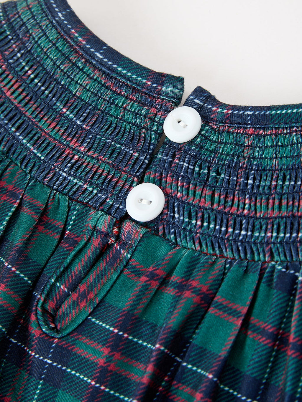 Girls plaid bubble romper with elastic smocking and white button front