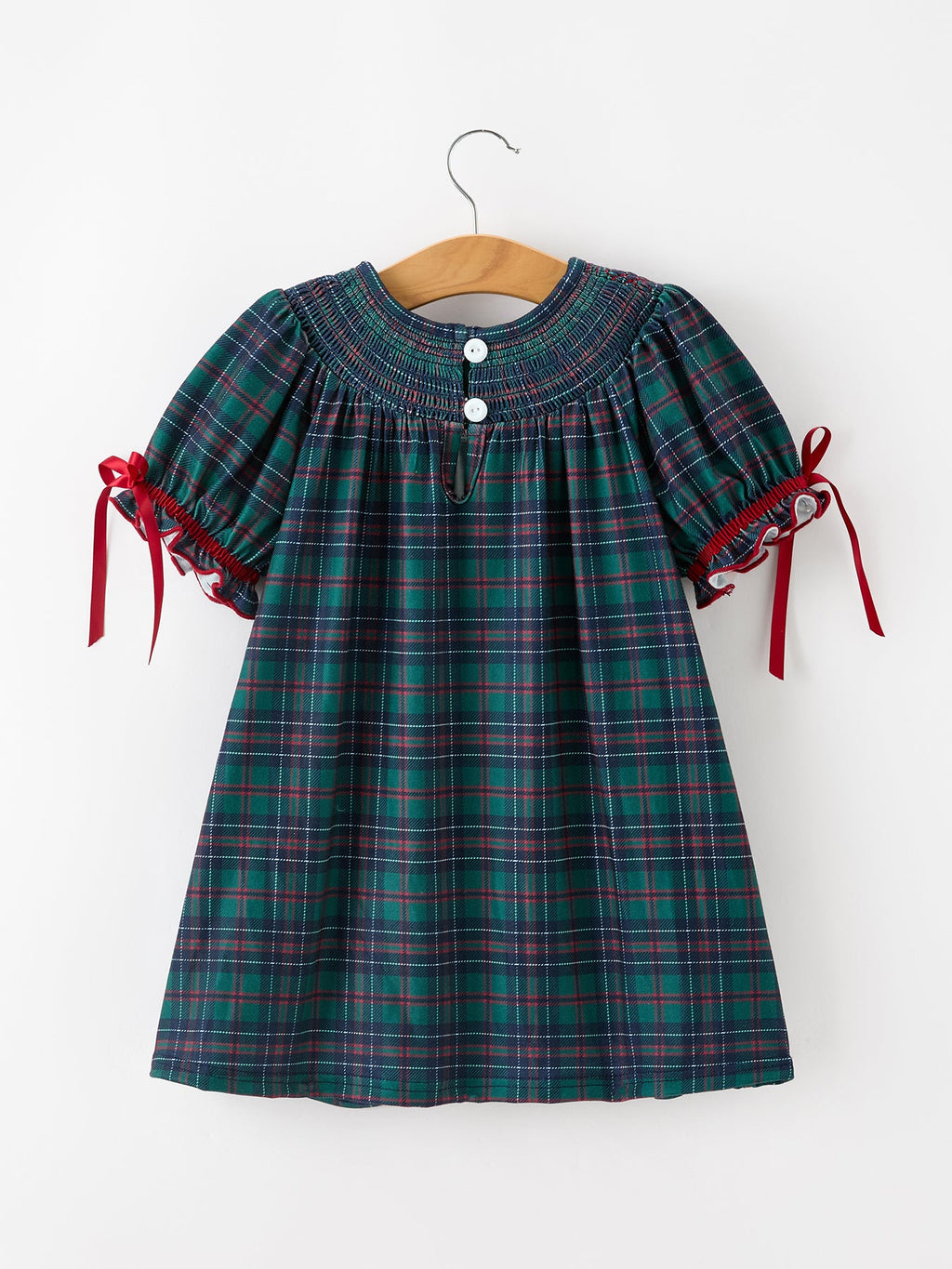 Plaid smocked dress with puff sleeves, red ribbon ties, teal and red check button front