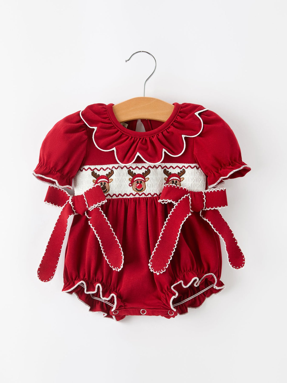 Red baby girl Christmas reindeer smocked bubble romper with white ruffle yoke and skirt trim