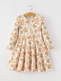 Girls long-sleeve twirl dress in cream with gingerbread cookie and candy cane print
