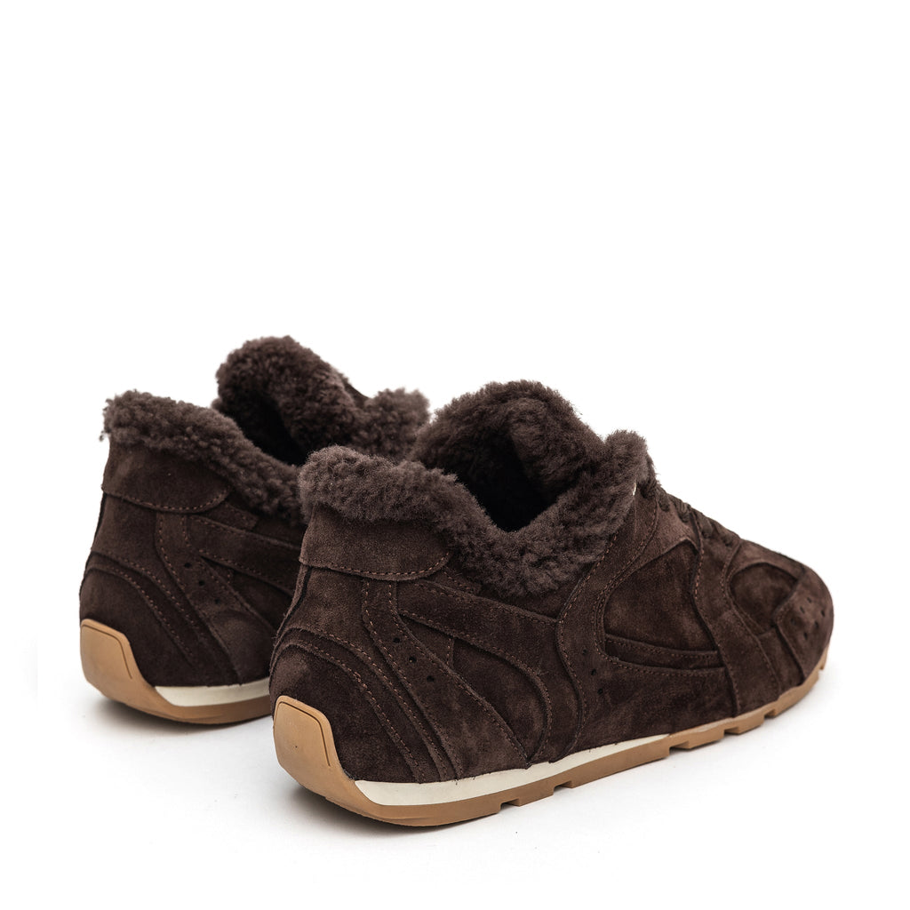 Brown suede shearling sneakers with rear heel cup and lace-up front