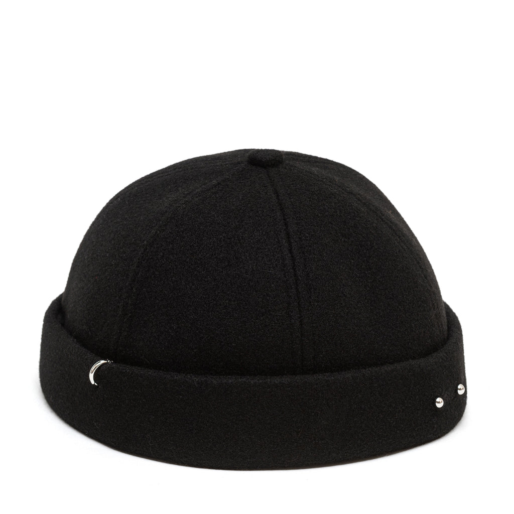 Black docker cap with short curved brim and centered seam