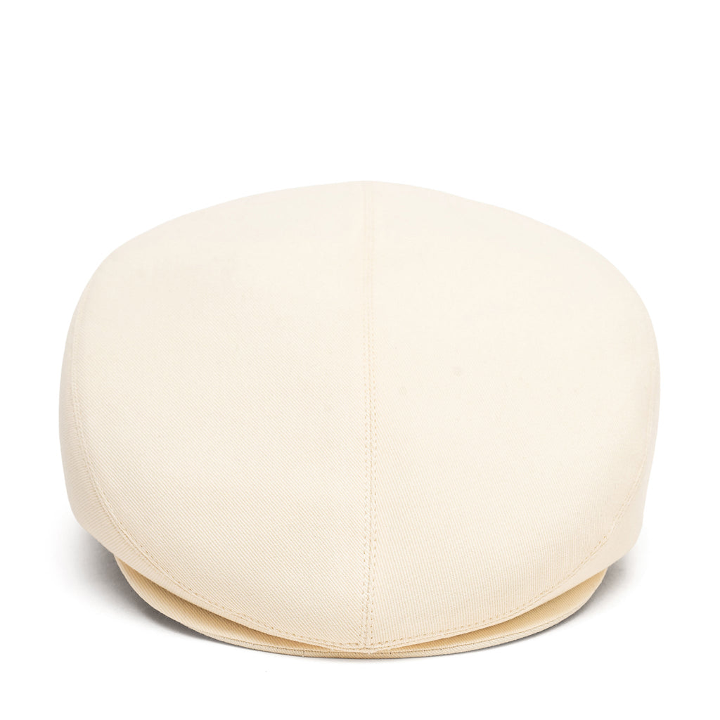 Ivory cotton ivy cap hat, back view with central seam and curved brim