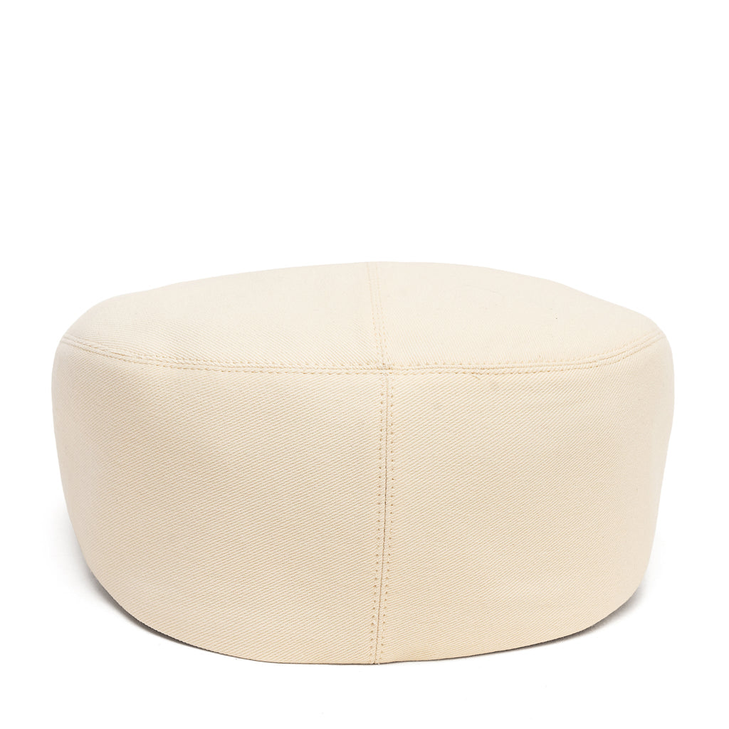 Ivory cotton ivy cap hat, close side view with stitched center seam