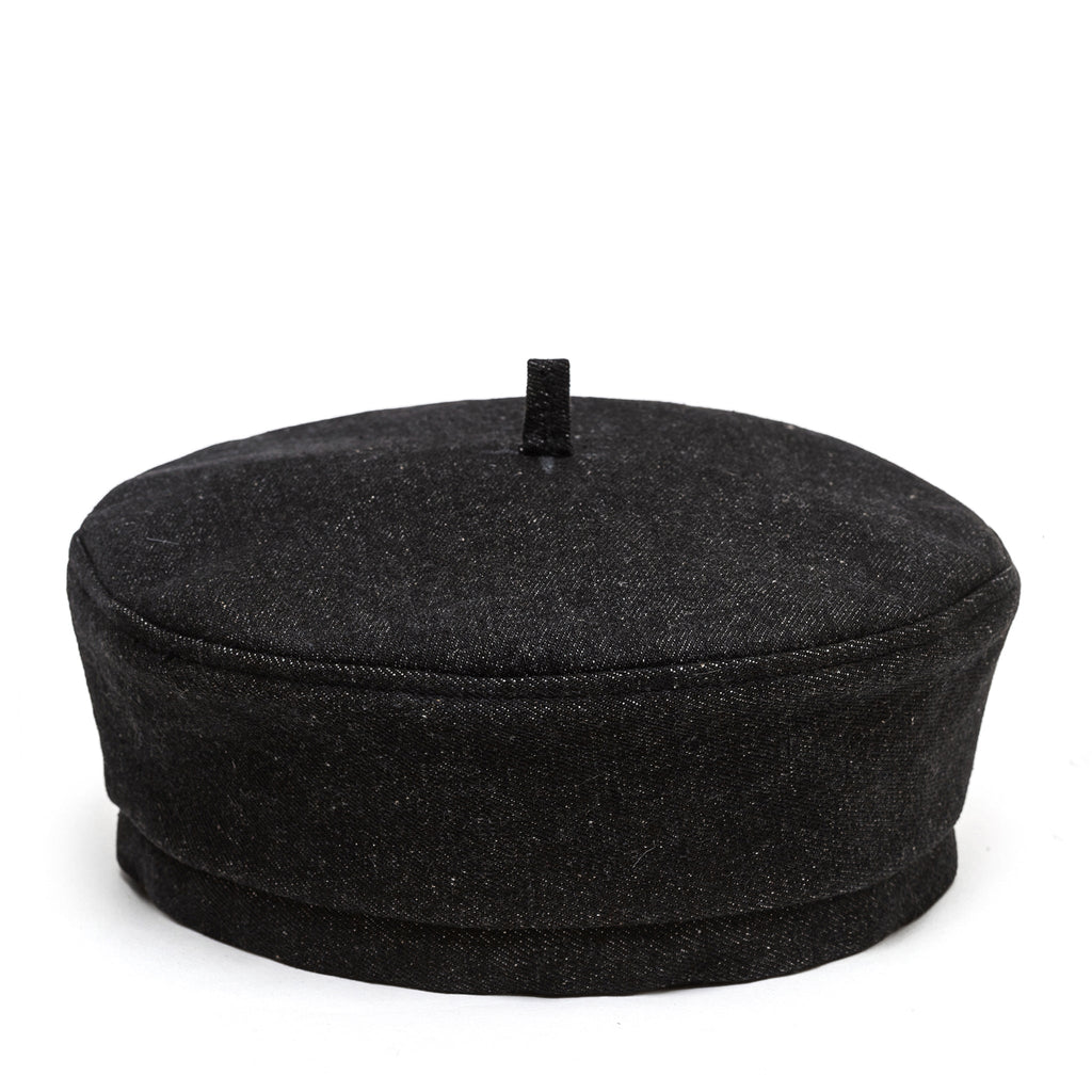 Black beret-style Paris hat with short round crown and small top tab