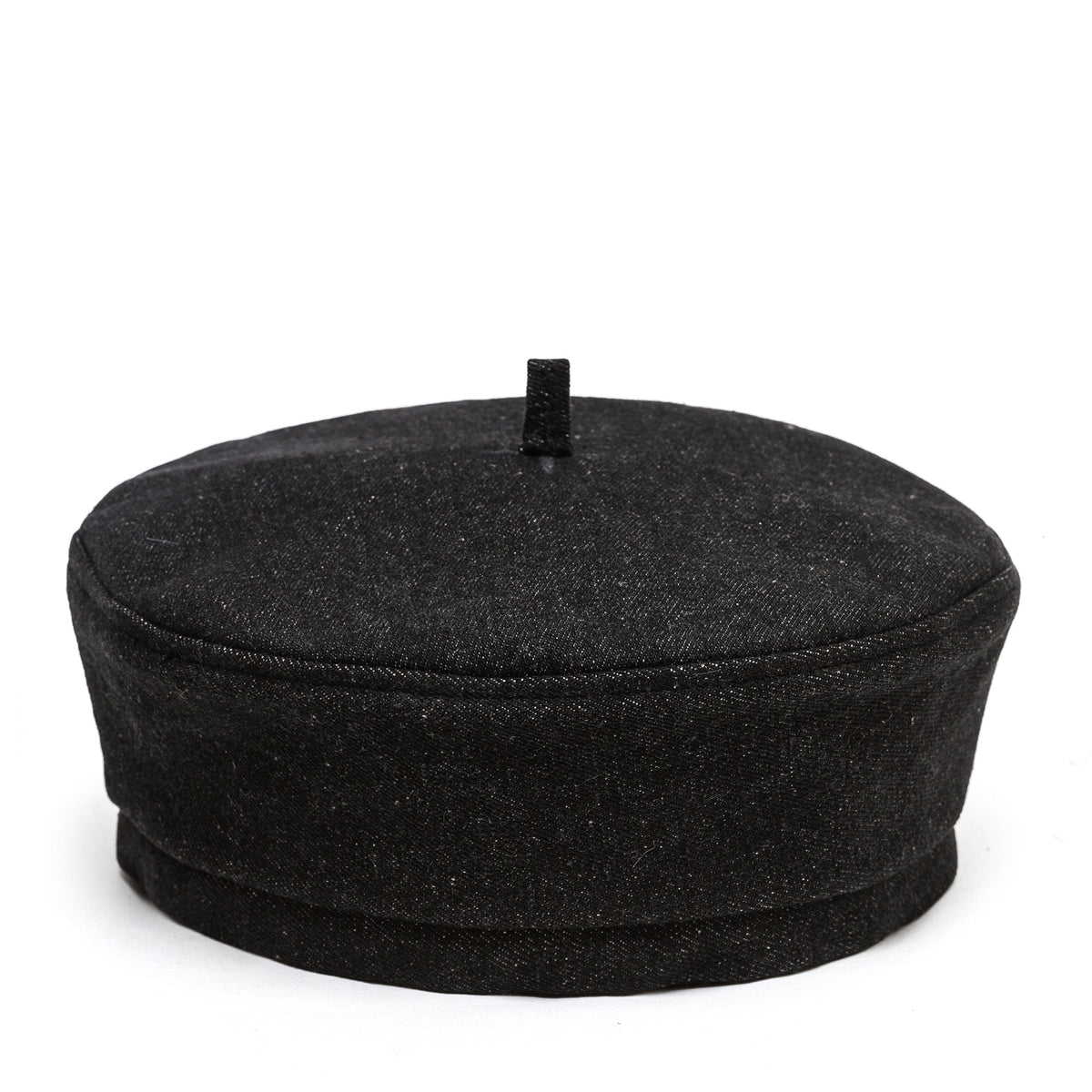 Black beret-style Paris hat with short round crown and small top tab