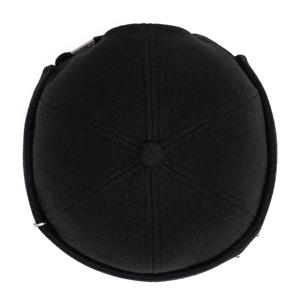 Black docker cap back top with seam lines and small metal eyelets