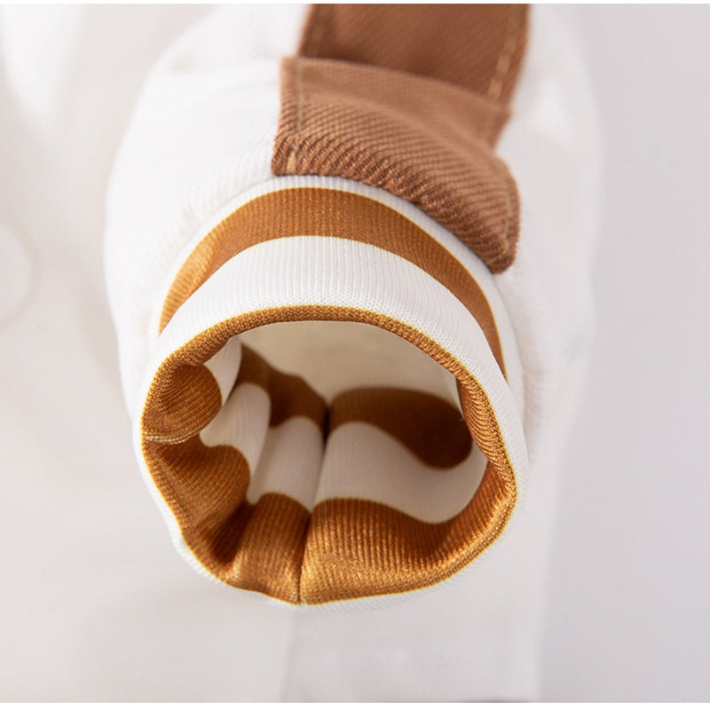 Brown and white striped dog jacket sleeve opening