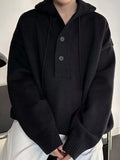 Black knit hooded button sweater with ribbed cuffs and hem