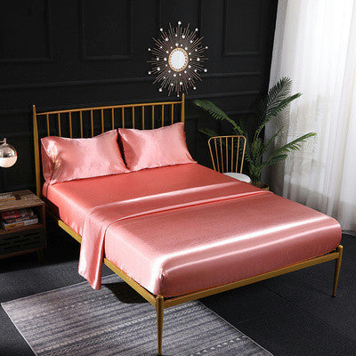Satin bedding set with blush pink sheet and matching pillowcases, 4-piece set