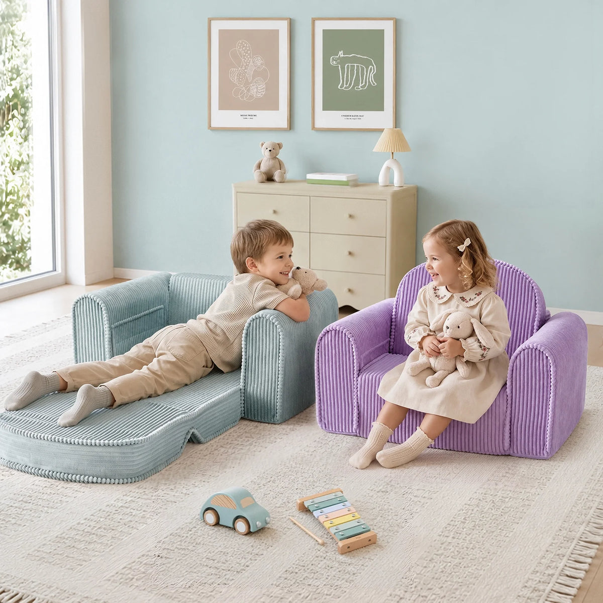 Corduroy kids lounge chairs in teal and purple with children seated holding plush toys