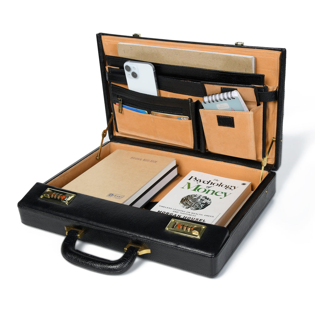 Open black briefcase with tan interior compartments and document slots