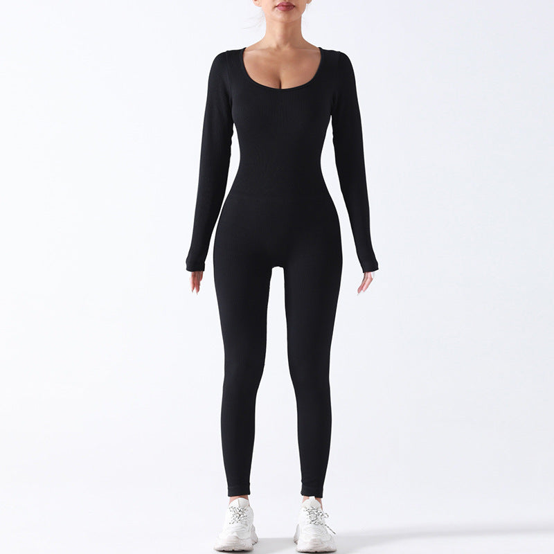 Seamless long-sleeve yoga jumpsuit, fitted black full-length bodysuit with scoop neck