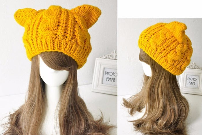 Women’s knitted cat-ear beanie hat, bright yellow with chunky cable-knit pattern
