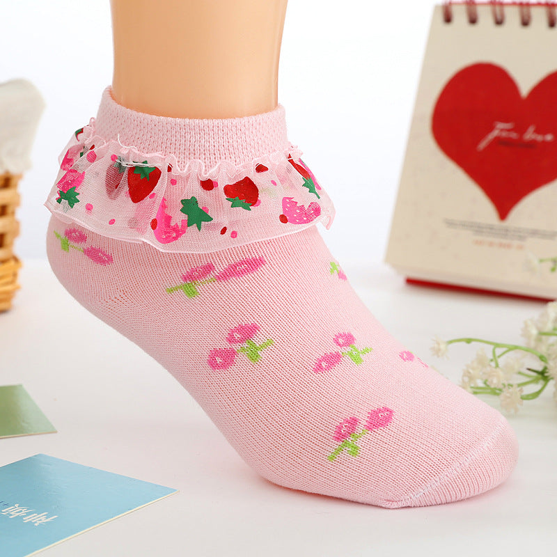 Girls pink cotton ankle socks with strawberry motifs and layered tulle lace cuff