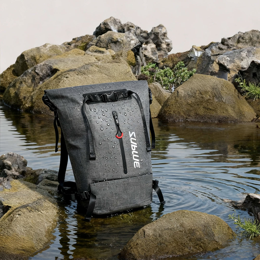 Waterproof backpack 30L, dark gray with water droplets on fabric and sealed top