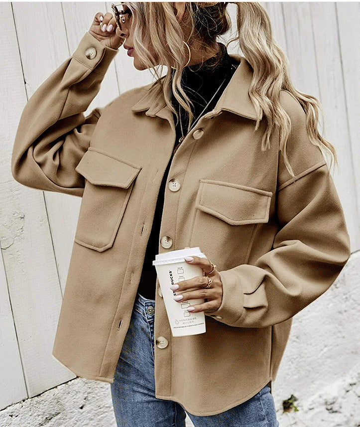 Women’s single-breasted lapel coat in tan, flap pockets and button front, long sleeves