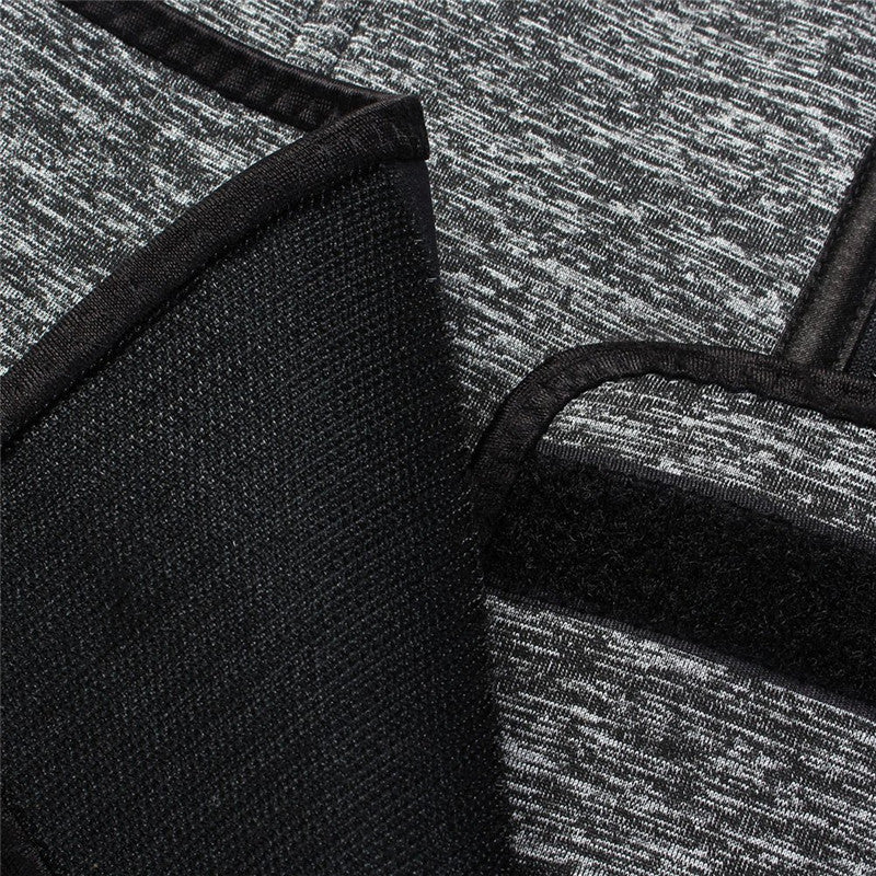 Close-up of black and heather grey padded waist belt fabric with textured finish
