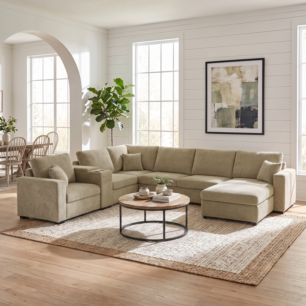 Beige modular sectional sofa with chaise, corner armrests, and plush seat cushions