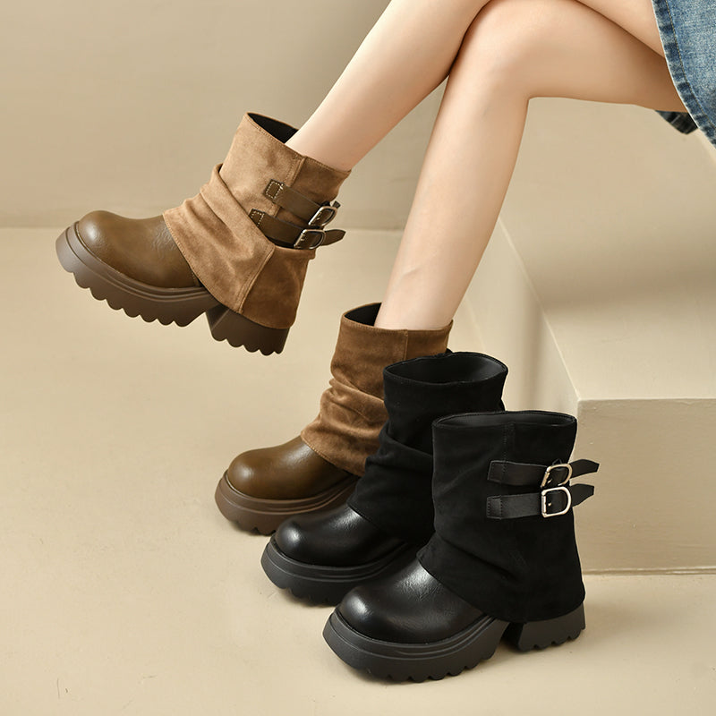 Tan and black slouchy platform combat ankle boots with buckled straps and thick soles.