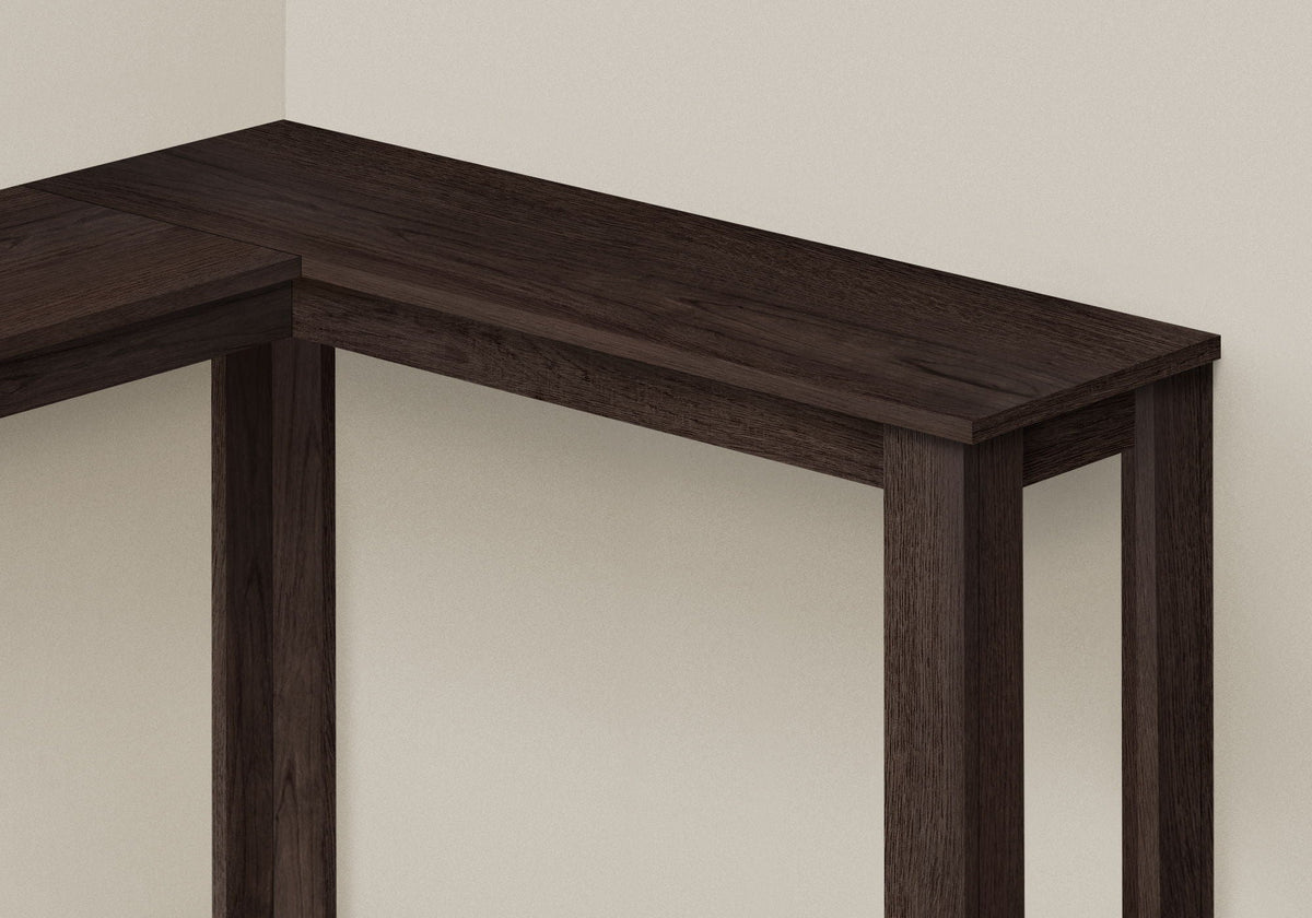 Dark brown corner accent console table top corner close-up with four supporting legs