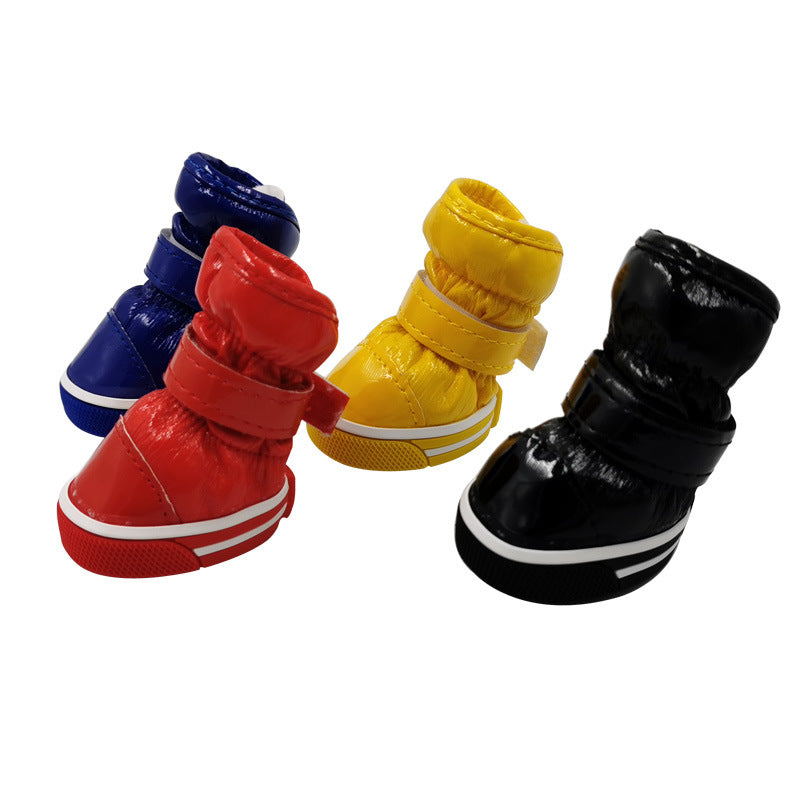 Pet ski boots in blue, red, yellow, and black, side views with hook-and-loop straps
