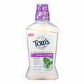 Toms of Maine Whole Care fresh mint natural mouthwash bottle with purple cap