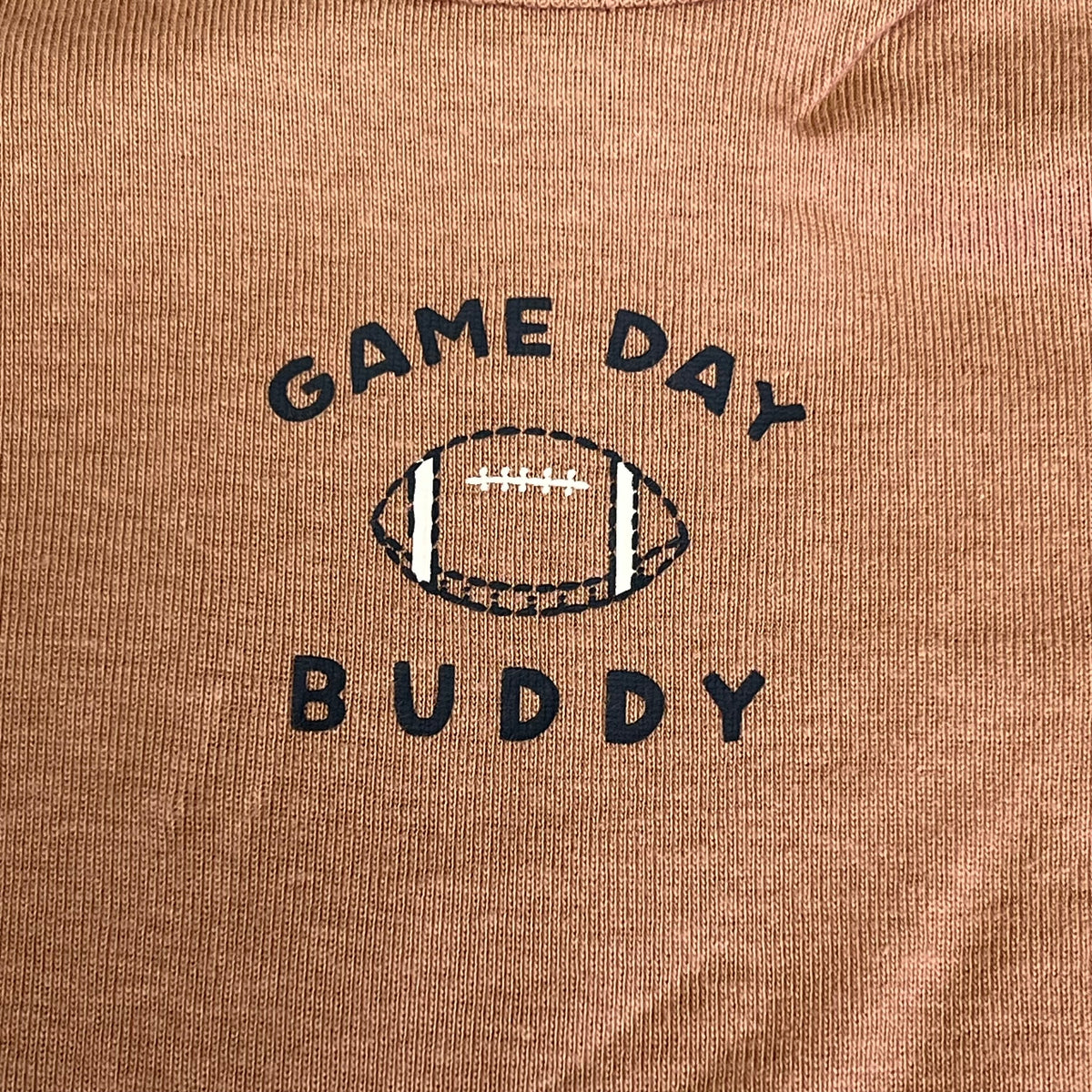 Brown bodysuit chest graphic: “GAME DAY BUDDY” with football design.