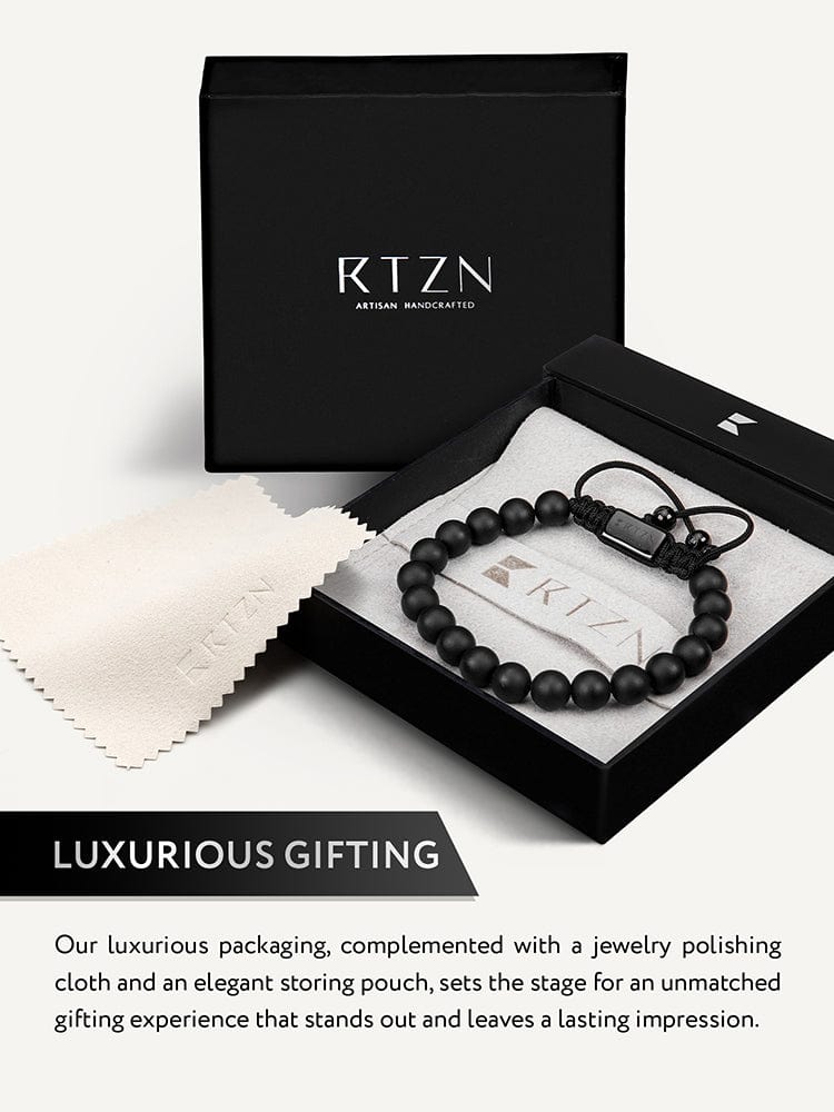 Black beaded bracelet on card inside a black gift box