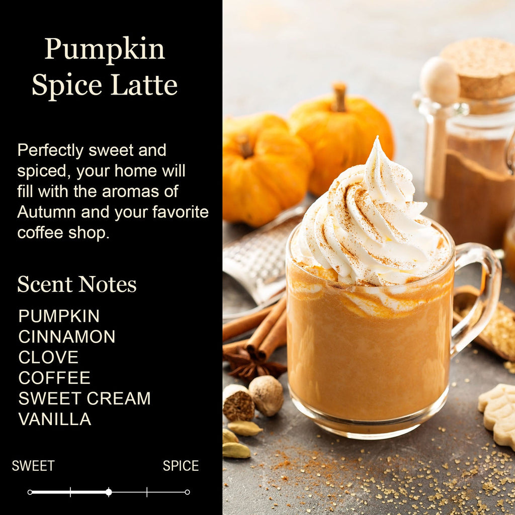 Pumpkin spice latte in glass mug with whipped cream, pumpkins and cinnamon