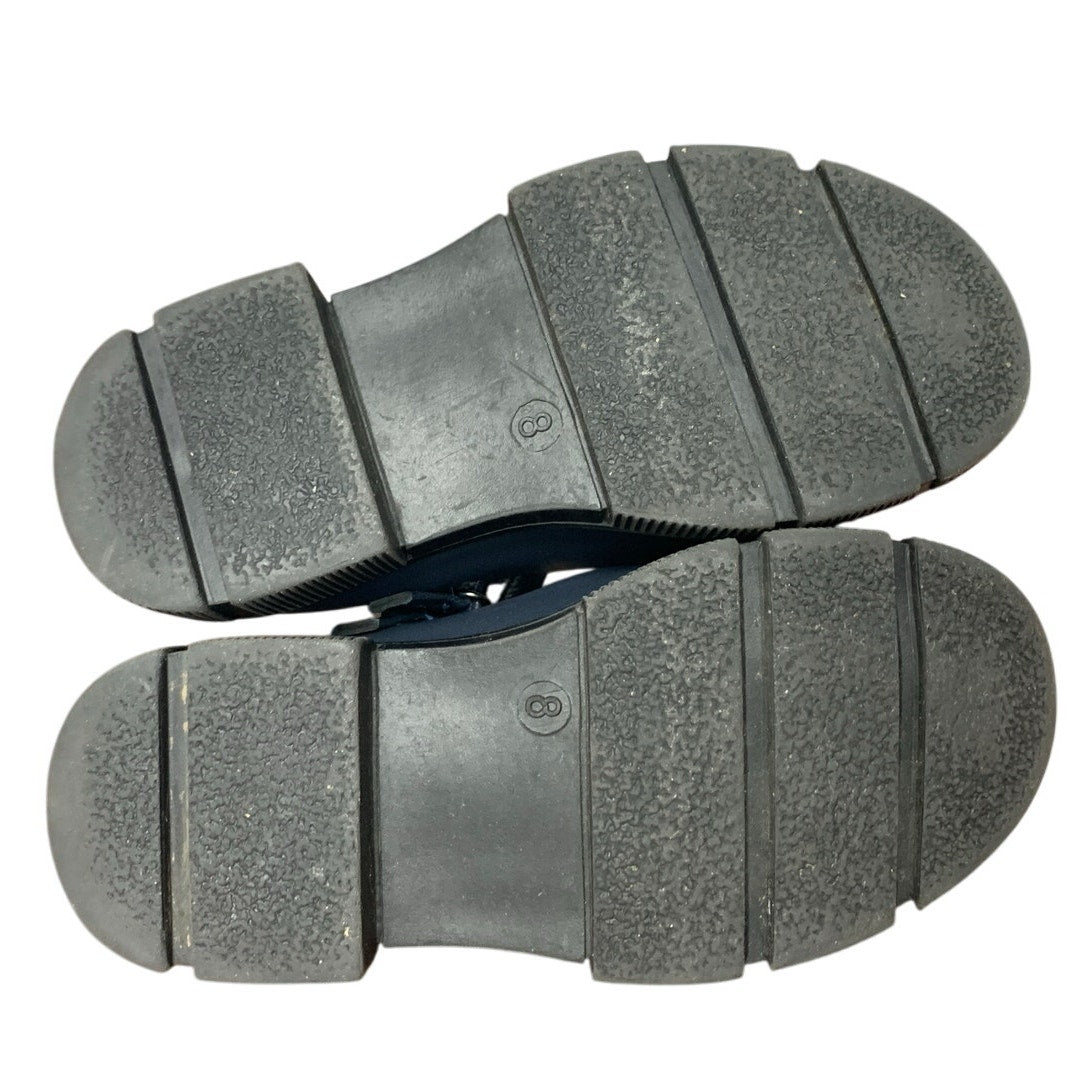 Navy toddler Mary Jane shoe outsoles with textured tread and hook-and-loop strap