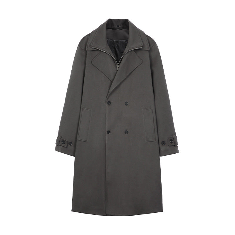 Gray double-breasted long trench coat with notched lapels, flap pockets, and button front