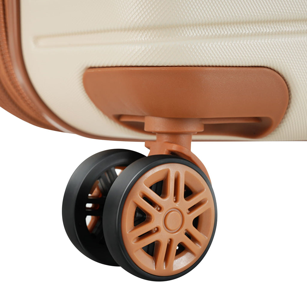 Hard-shell rolling suitcase wheel with dark brown rim and brown retractable handle