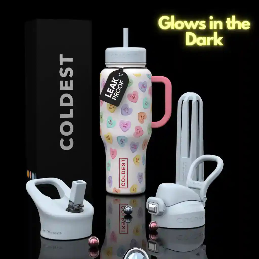 COLDEST 36oz insulated tumbler with leak-proof lid, pastel heart icons, metal straw.