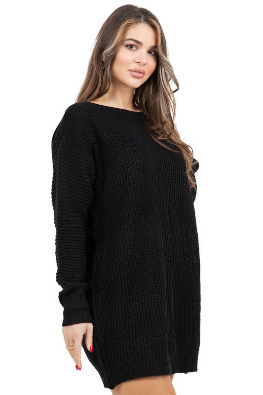Black knit sweater dress with long sleeves and mini length