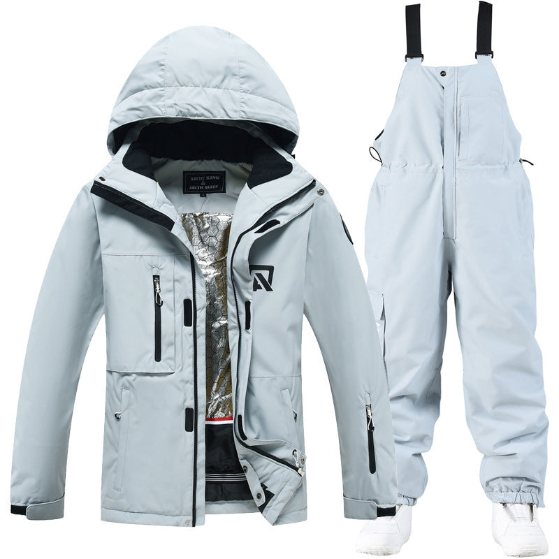 Light blue winter ski suit jacket with hood and matching bib ski pants